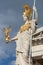 statue of athena in front of the austrian parliament in vienna (austria)