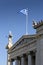 Statue of Athena and the Greek flag