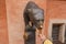 Statue of a bear with a long tongue at the Town Hall in Wroclaw. Poland