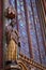 Statue and Beautiful stained glass windows Sainte-Chapelle, Paris France