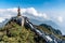 Statue of the Bodhisattva on Fansipan mountain peak the highest mountain in Indochina Backdrop Beautiful view blue sky and cloud