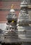 Statue of Buddha in front of small temple, Kathmandu, Nepal