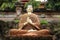 Statue of Buddha meditation at Buddhist Temple in Bali, Indonesia
