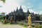 Statue of the Buddhist God Buddha in the Buddhist temple Brahma Vihara Arama with statues of the gods on Bali island, Indonesia.