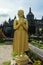 Statue of the Buddhist God Buddha in the Buddhist temple Brahma Vihara Arama with statues of the gods on Bali island, Indonesia.