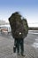 Statue of businessman with a rock for a head, Reykjavik, Iceland