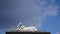 Statue in a cemetery with clouds. time lipse