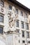 Statue of Cosimo I de Medici in front of Palazzo della Carovana built in 1564 located at the palace