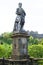 Statue in Edinburgh, Scotland with castle in background