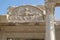 Statue in Ephesus, people and plants figures