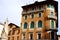 Statue and facade of a building next to the one of the Three hundred in Treviso in Veneto (Italy)