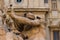 Statue the Fontana dei Quattro Fiumi with pigeons