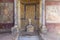 Statue and frescoes at ancient House of Octavius Quartio (Casa di Ottavio Quartione), Pompeii, Naples, Italy