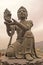 Statue in front of Buddha in Hong Kong