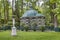 Statue and garden house at Peterhof Gardens close to St. Petersburg in Russia