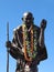 Statue of Ghandi wearing real leis