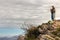 Statue of God Mother with Jesus baby in Pyrenees mountains, France. Sculpture of Our Lady with Jesus Christ on mountain top.