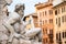 Statue of the god Zeus in Bernini`s Fountain in the Piazza Navona, Rome