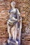 Statue of Goddess Fortuna Annonaria in the courtyard of the Domus of Fortuna Annonaria - Ostia Antica - Rome