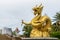 Statue of golden dragon in the Queen Sirikit Public Park in Phuket