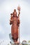 Statue of Hindu God Shiva at the sacred lake of Grand Bassin in the South of the island of Mauritius.