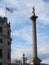 The statue honoring Lord Nelson stands watch over London