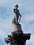 The statue honoring Lord Nelson stands watch over London