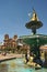 Statue of Inca Pachacutec on fountain and catholic church on Plaza de Armas, view,( Cusco or Cuzco