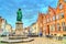 Statue of Jan van Eyck, an Early Netherlandish painter in Bruges, Belgium