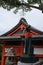 Statue of a Japanese fox Kitsune in the Fushimi Inari Shinto Shrine
