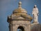 Statue of Jesus Christ and bell tower on Catholic church in Portugal