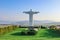 Statue of Jesus Christ with mountains in the backround