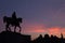 Statue of king Albert I at sunset on the horse