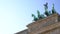 Statue known as the Quadriga, the goddess of victory on top of The Brandenburg Gate, Berlin, Germany