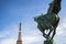 Statue of La France renaissante with the Eiffel tower on the background in Paris in France