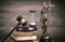 Statue of Lady Justice, hourglass, book and gavel