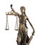 Statue of Lady Justice isolated on white. Symbol of fair treatment under law