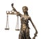 Statue of Lady Justice isolated on white. Symbol of fair treatment under law