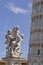 Statue and leaning Tower of Pisa