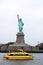 Statue of Liberty and a New York Yellow Water Taxi