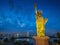 Statue of Liberty and Rainbow bridge, located at Odaiba Tokyo, w