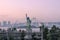 Statue of liberty with rainbow bridge in Odaiba seaside park