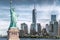 The statue of Liberty with World Trade Center background, Landmarks of New York City