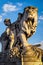 Statue of a lion on the Pont Alexandre III in Paris