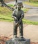 Statue of a little girl with a watering can -Our Children`s Memorial Garden