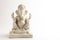 Statue of Lord Ganesha Made from plaster of Paris without color on white background