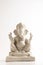 Statue of Lord Ganesha Made from plaster of Paris without color on white background