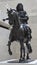 Statue man on horse Louvre in Paris France