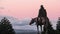 Statue of man riding a horse in Bariloche, Argentina