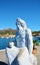 Statue in marble in Porto Azzurro, in Elba island, Italy